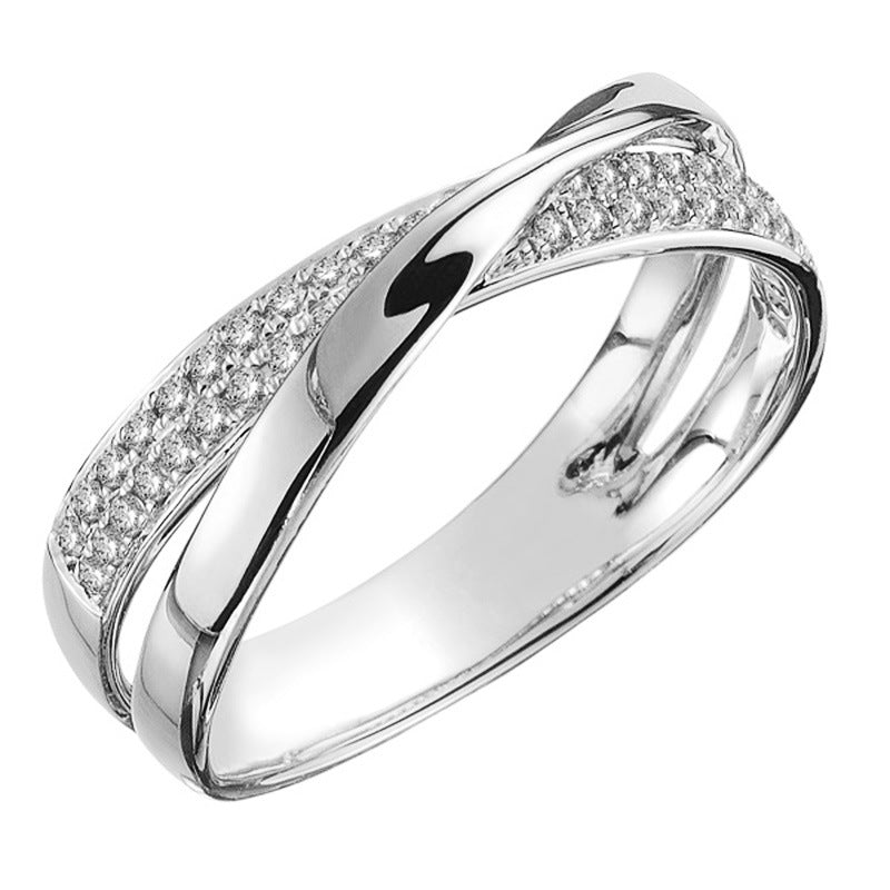 Anillo de plata con circonitas entrelazadas en oro vintage