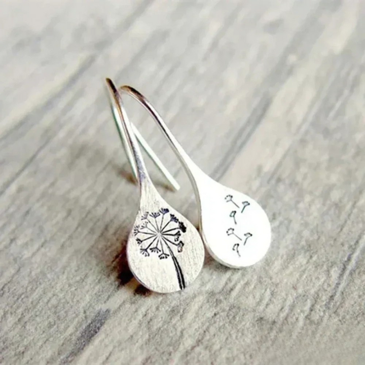 Pendientes de plata elaborados con diseño de hoja de diente de león