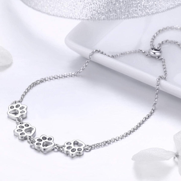 Pulsera Ajustable de Plata de Ley con Diseño de Huella de Perro
