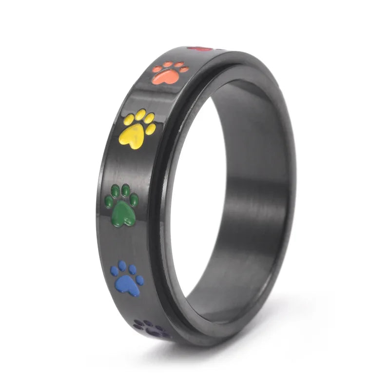 Anillo Antiestrés Ajustable con Huellas – Anillo de Acero Inoxidable en Tonos Arcoíris
