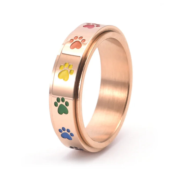 Anillo Antiestrés Ajustable con Huellas – Anillo de Acero Inoxidable en Tonos Arcoíris