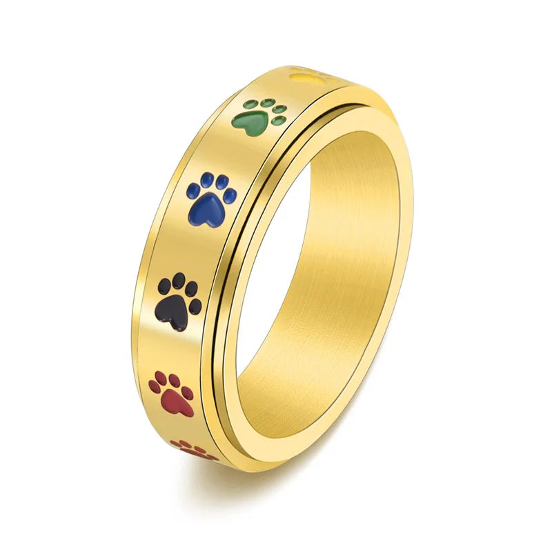 Anillo Antiestrés Ajustable con Huellas – Anillo de Acero Inoxidable en Tonos Arcoíris