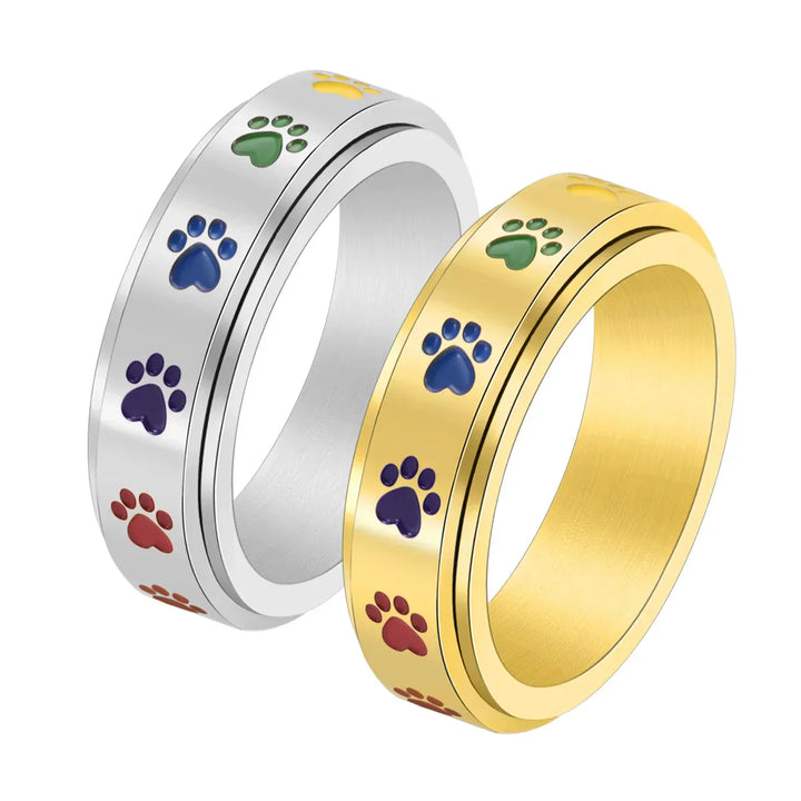 Anillo Antiestrés Ajustable con Huellas – Anillo de Acero Inoxidable en Tonos Arcoíris